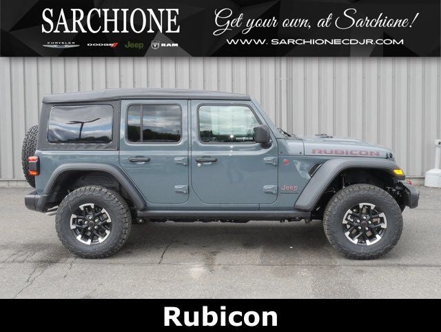 2026 Jeep Wrangler Rubicon in Anvil Clear Coat — front three-quarter view