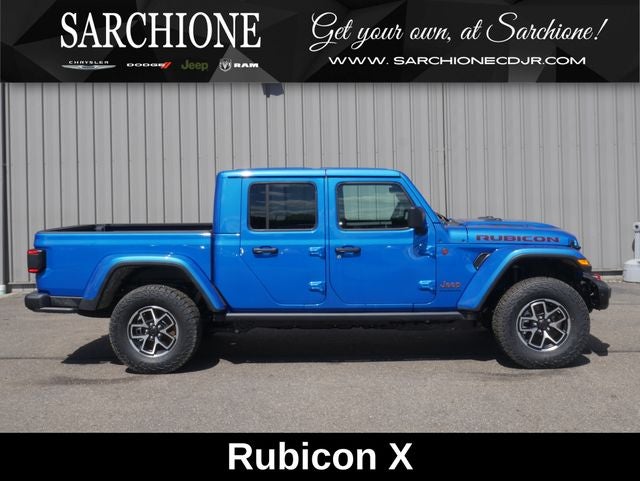 2026 Jeep Gladiator Rubicon X X in Hydro Blue Pearlcoat — front three-quarter view
