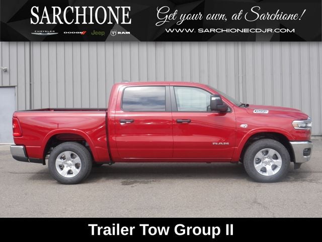 2026 RAM Ram 1500 Big Horn/Lone Star in Molten Red Pearlcoat — front three-quarter view
