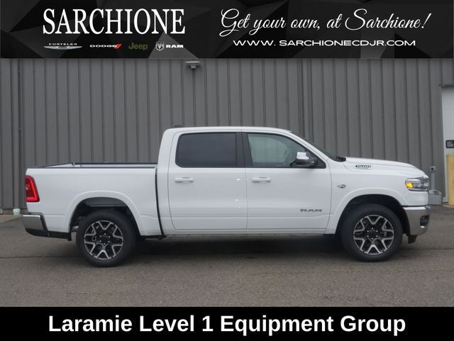 2026 RAM Ram 1500 Laramie in Bright White Clearcoat — front three-quarter view