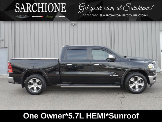2022 RAM 1500 Laramie in Diamond Black Crystal Pearlcoat — front three-quarter view