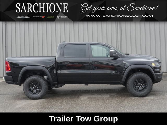 2026 RAM Ram 1500 RHO in Diamond Black Crystal Pearlcoat — front three-quarter view