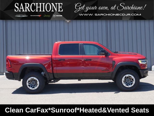 2026 RAM 1500 RHO in Molten Red Pearlcoat — front three-quarter view