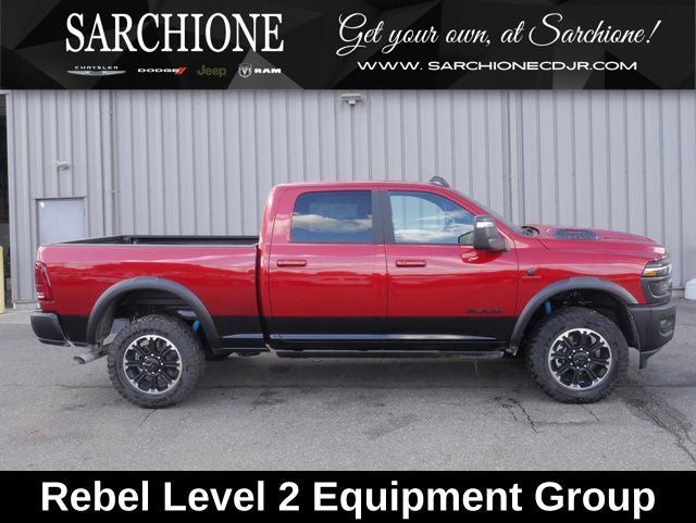 2026 RAM Ram 2500 Rebel in Molten Red Pearlcoat — front three-quarter view