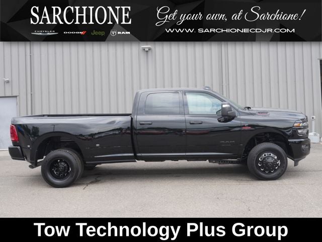 2026 RAM Ram 3500 Big Horn Night Edition in Diamond Black Crystal Pearlcoat — front three-quarter view