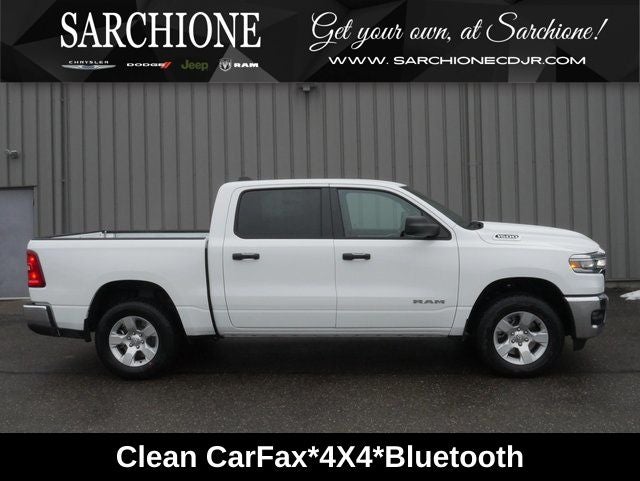 2026 RAM 1500 Big Horn/Lone Star in Bright White Clearcoat — front three-quarter view