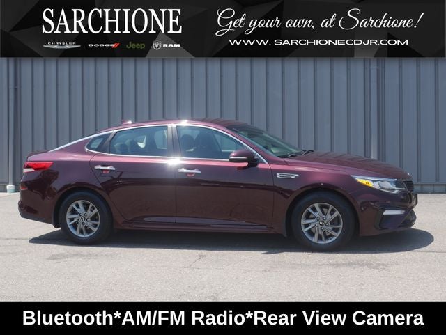 2019 Kia Optima LX in Sangria — front three-quarter view